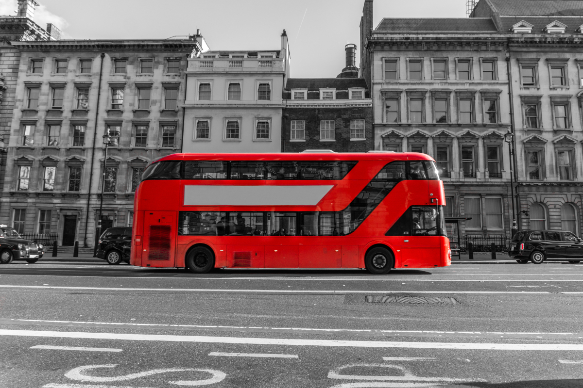 About Us - London Bus with B&W background